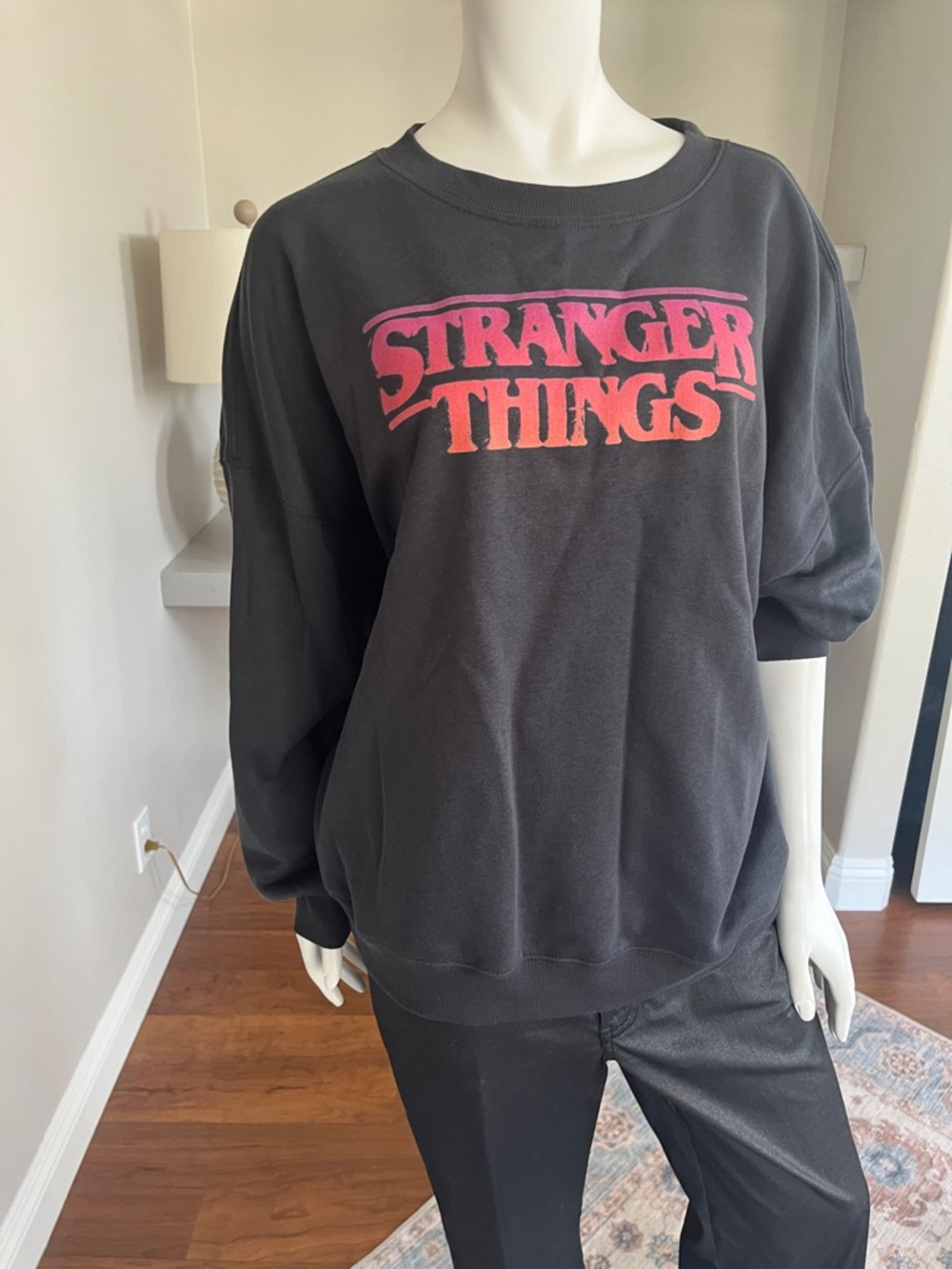 Netflix Stranger Things Black Sweatshirt with Pink/Orange Logo